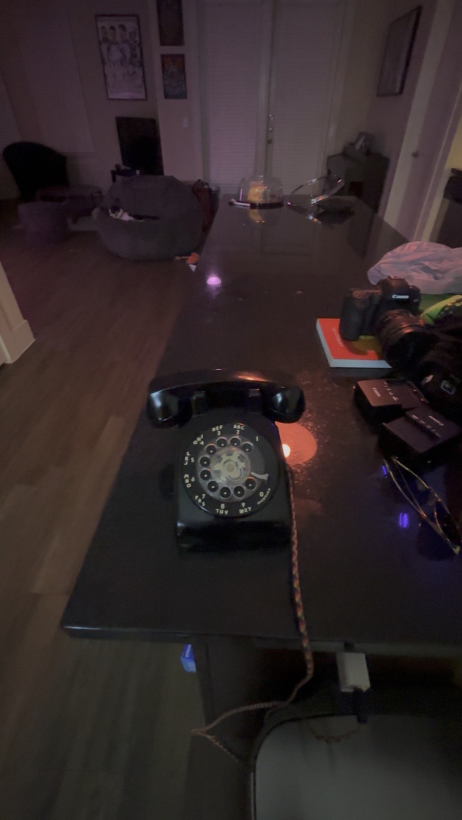 The same room a few seconds later, lit warm amber